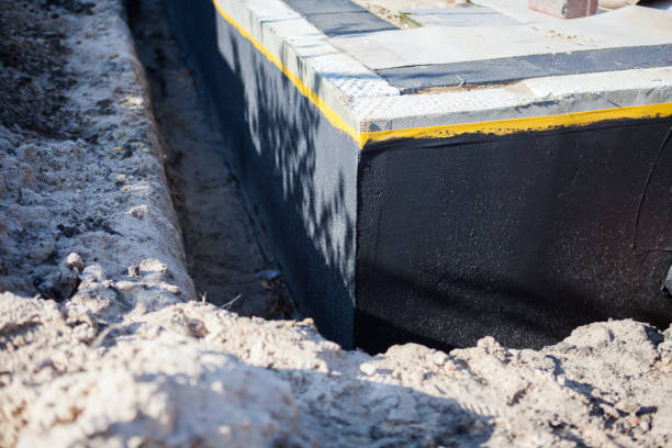 Professional Waterproofing technician working in Belle Center, OH